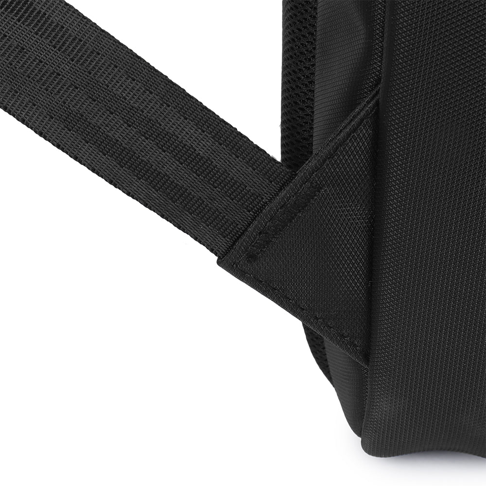 Close-up of a backpack shoulder-strap attachment with reinforced stitching at the load-bearing junction.