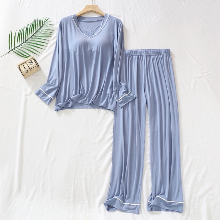 Blue modal pajama set laid flat, showing the type of lightweight close-to-skin garment where modal moisture behavior is relevant during long wear.
