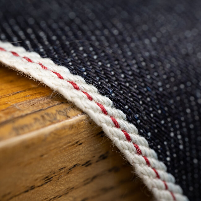 Red ID yarn woven into a selvedge edge