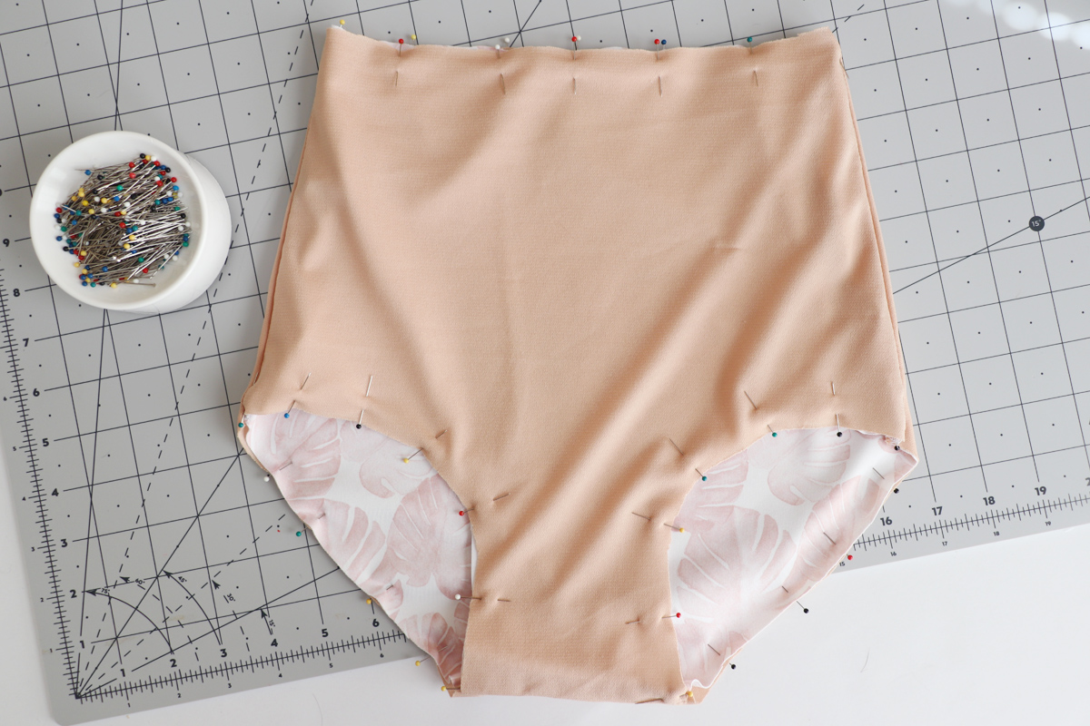 Bikini bottom shell and lining pinned together at the waist and leg openings