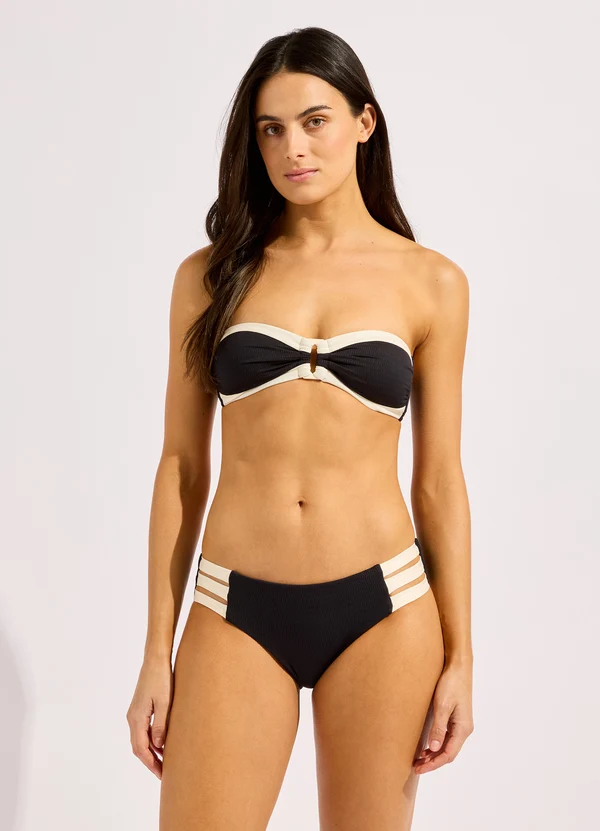 Black and cream bandeau bikini with a strapless upper edge