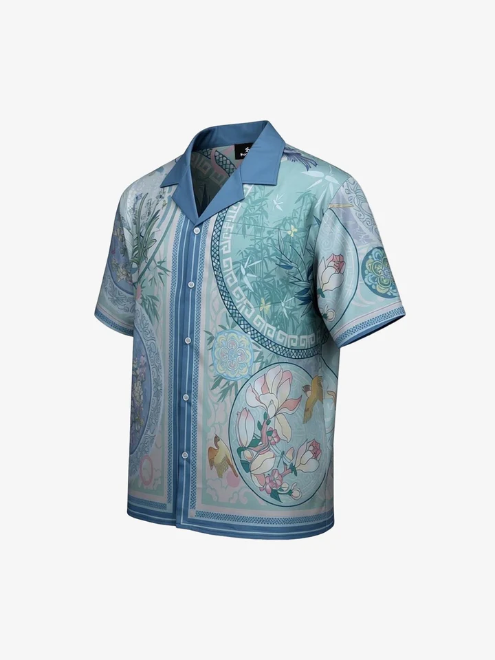 Blue short-sleeve shirt with a Cuban collar and an all-over porcelain-inspired floral print.