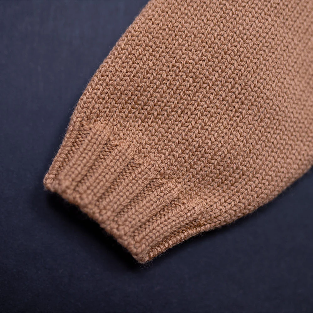 Close-up of a cardigan sleeve and ribbed cuff