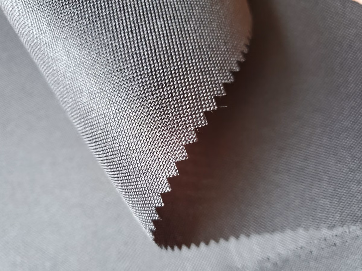 Close-up of performance fabric texture with zigzag-cut edge