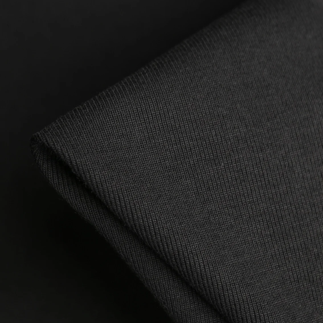 Fine rib columns in a cotton-elastane trim fabric.