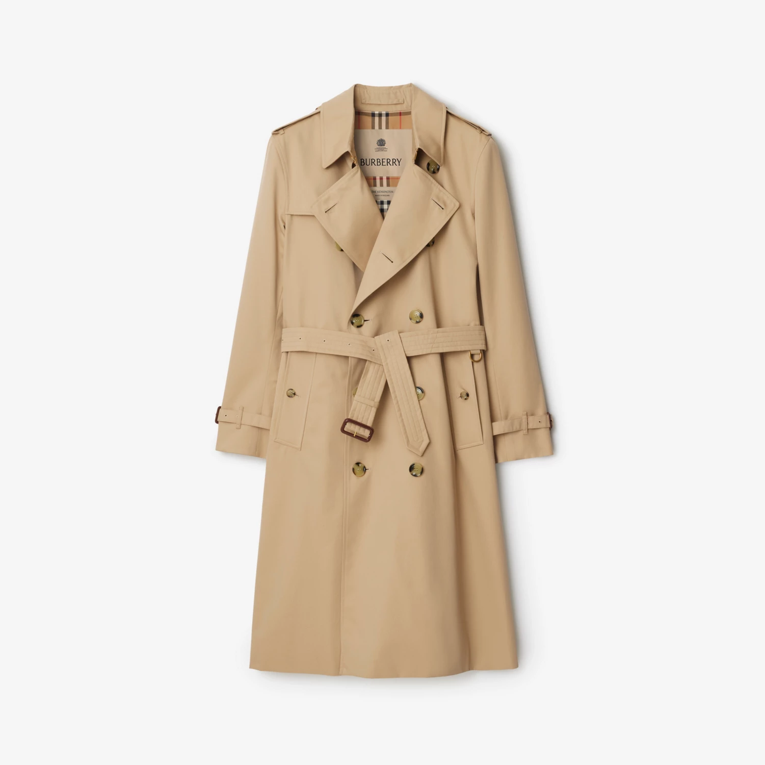 Honey beige trench coat with broad lapels, a belt, shoulder straps and buckled cuffs