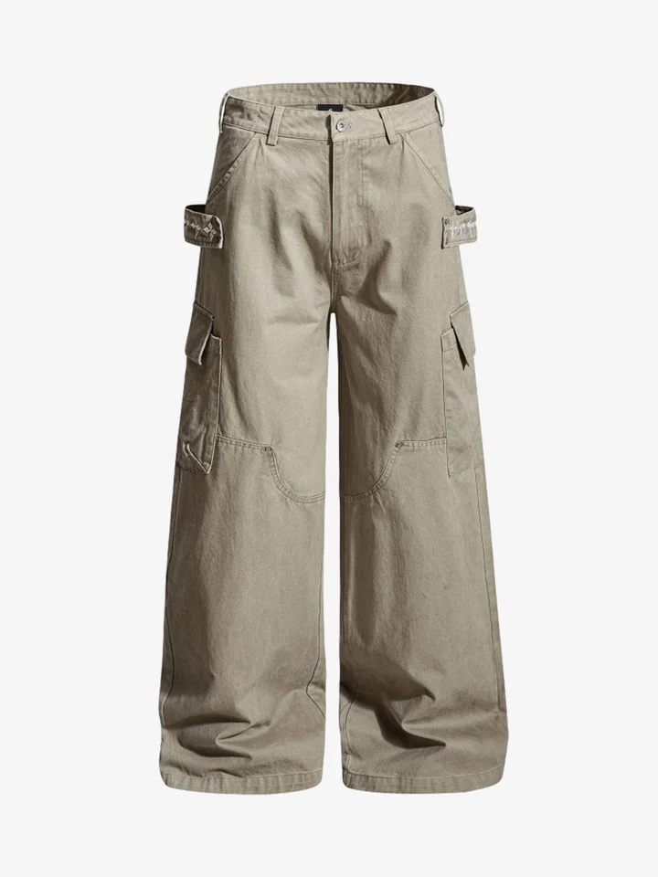 Khaki carpenter trousers showing roomy legs, side loops and pockets.