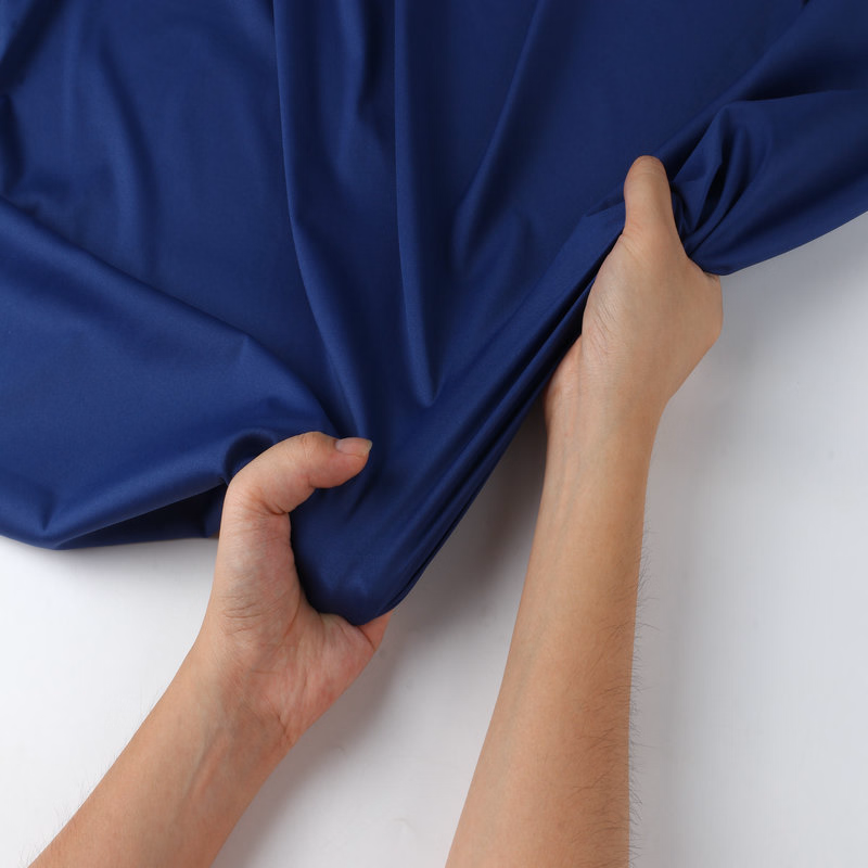 Nylon spandex fabric being stretched