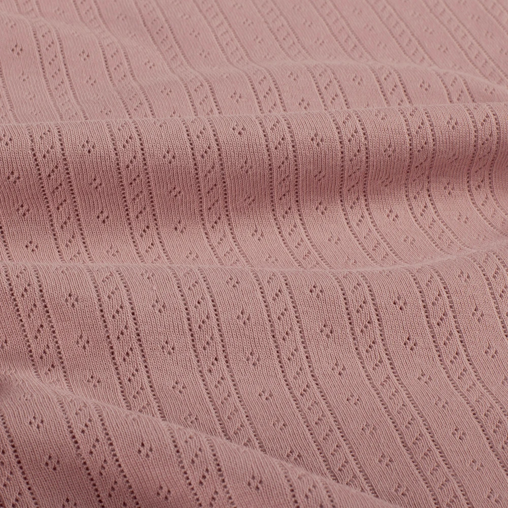 Pointelle knit structure showing repeated openwork holes