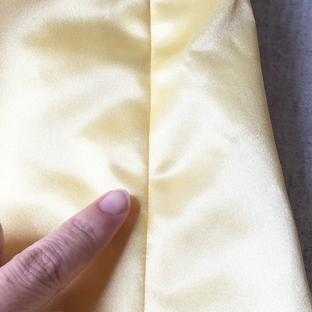 Puckering along a satin seam