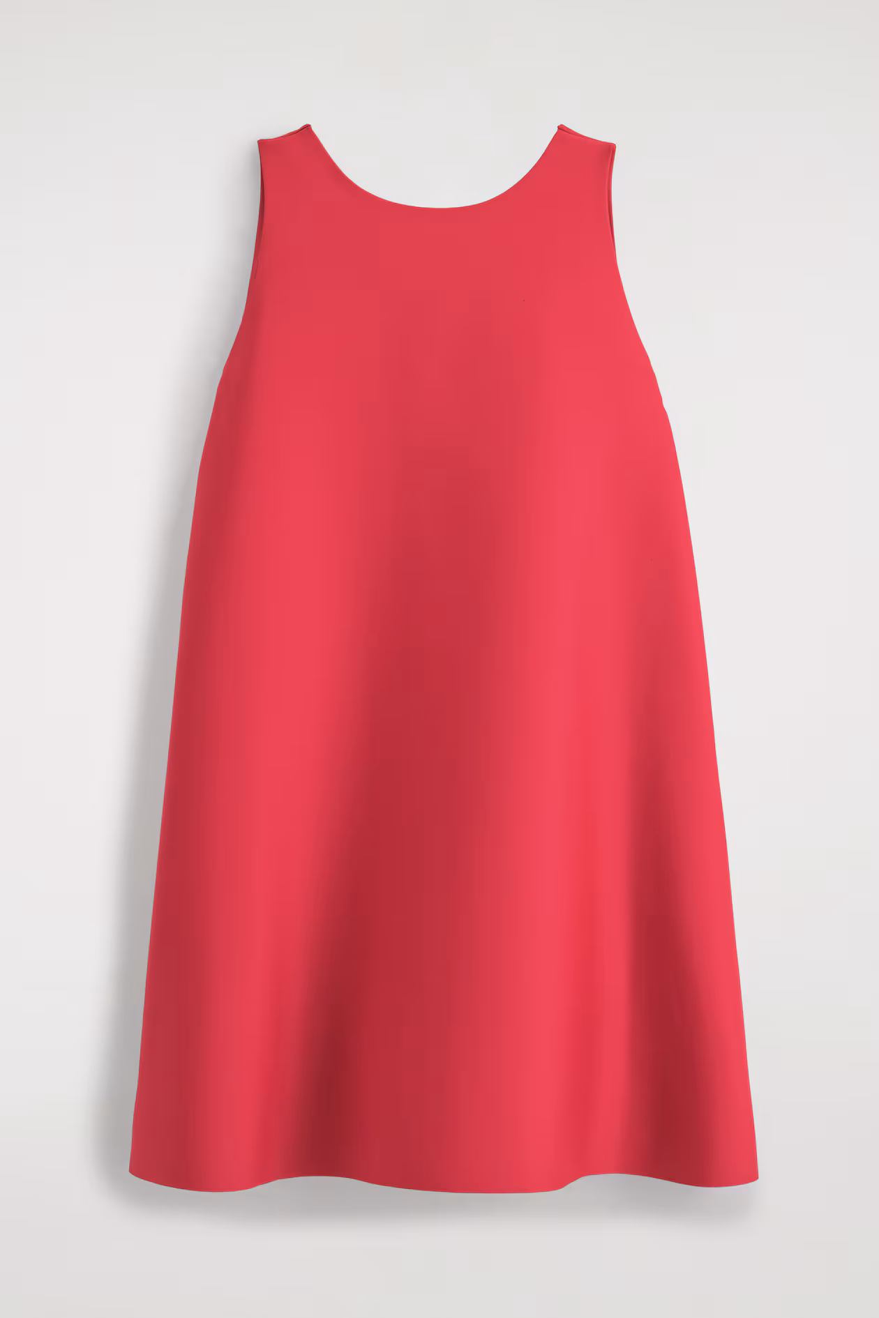 Red sleeveless A-line mini dress shown on its own, with a round neckline and a broad flared hem