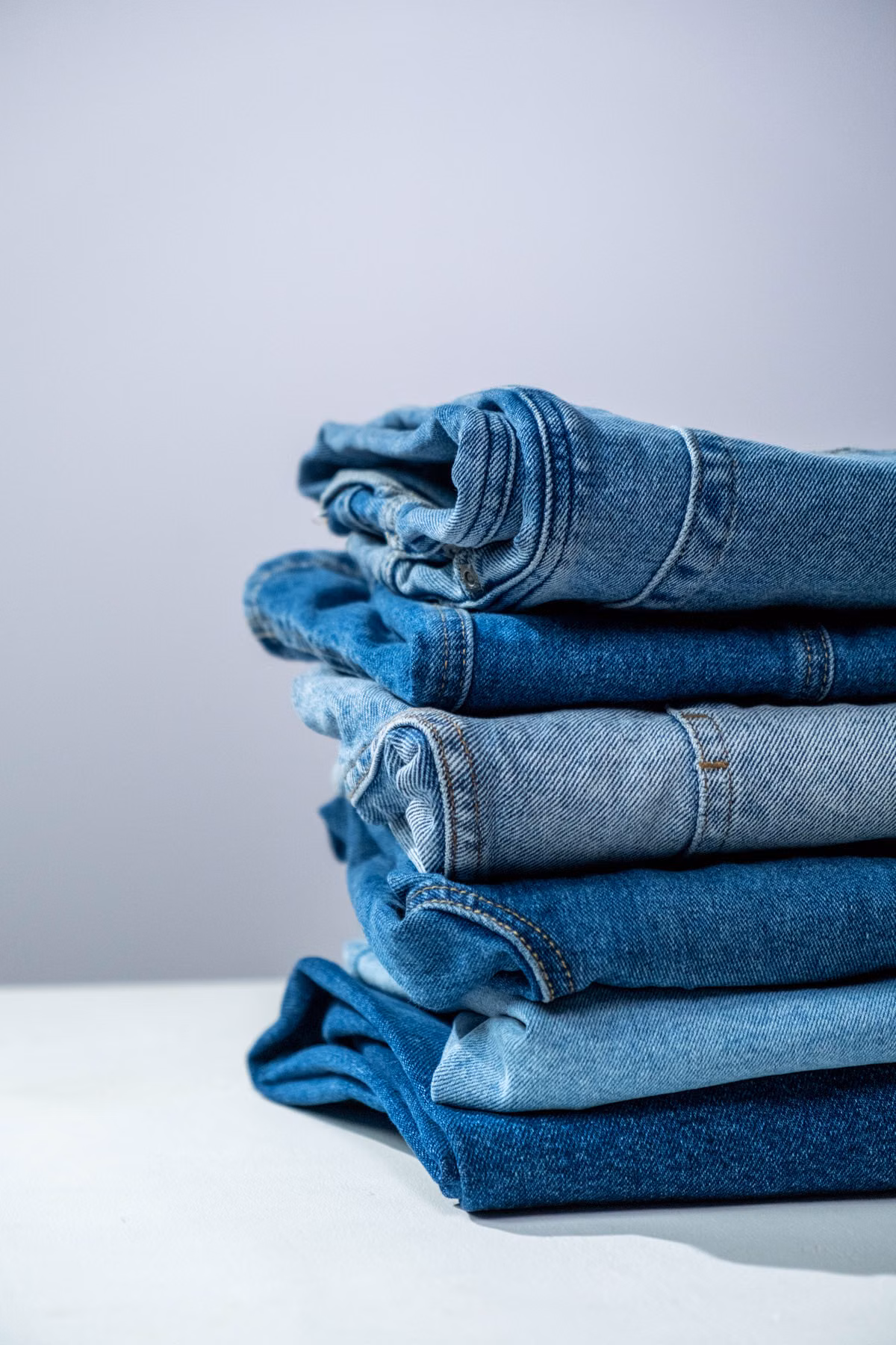 Stack of finished blue jeans representing an existing Stock Match product