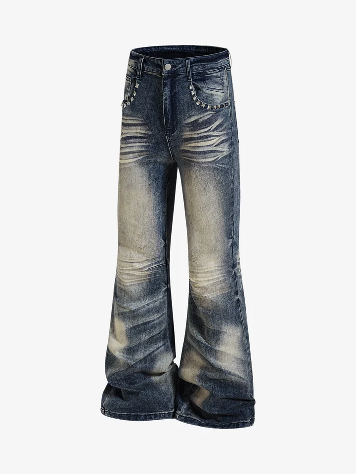 Washed flared jeans with studded pocket trim, displayed without a model.