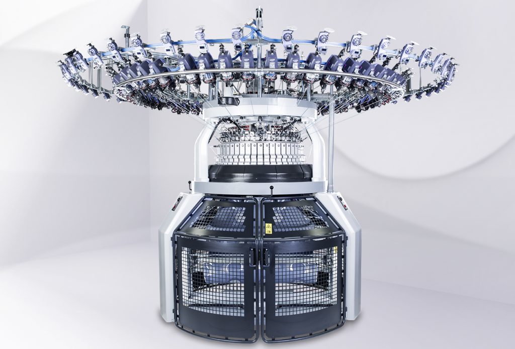 Yarn feeds arranged around a circular knitting machine.