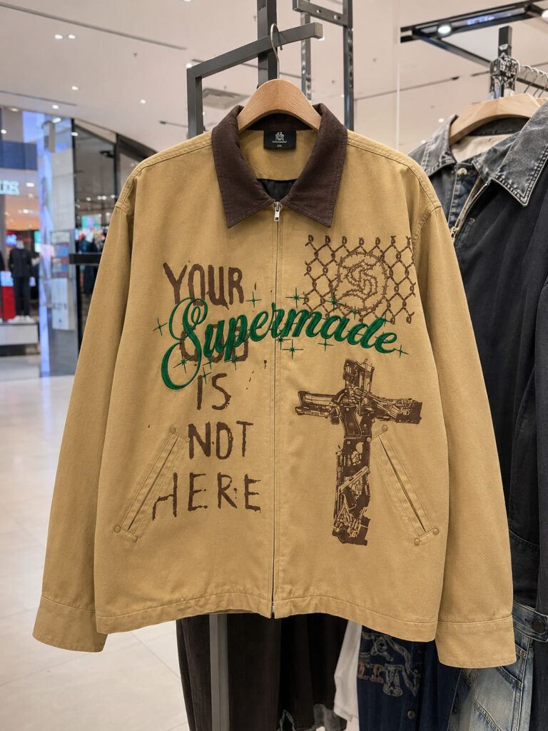 Customer-provided reference image — Controlled contrast: developing a sand-colored multi-print zip jacket