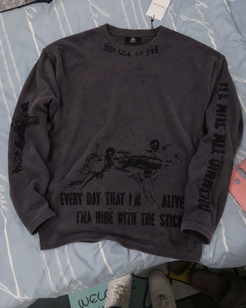 Customer-provided reference image — A washed look without losing the message: the waffle-knit long sleeve