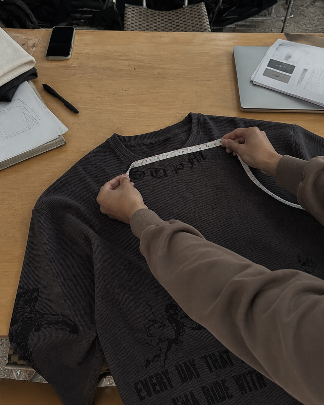 Garment measurement review against the development specifications.