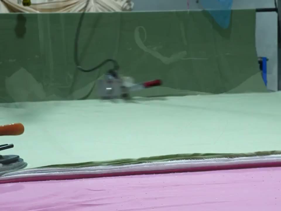 Waffle-knit garment panels during print positioning, screen printing and curing.
