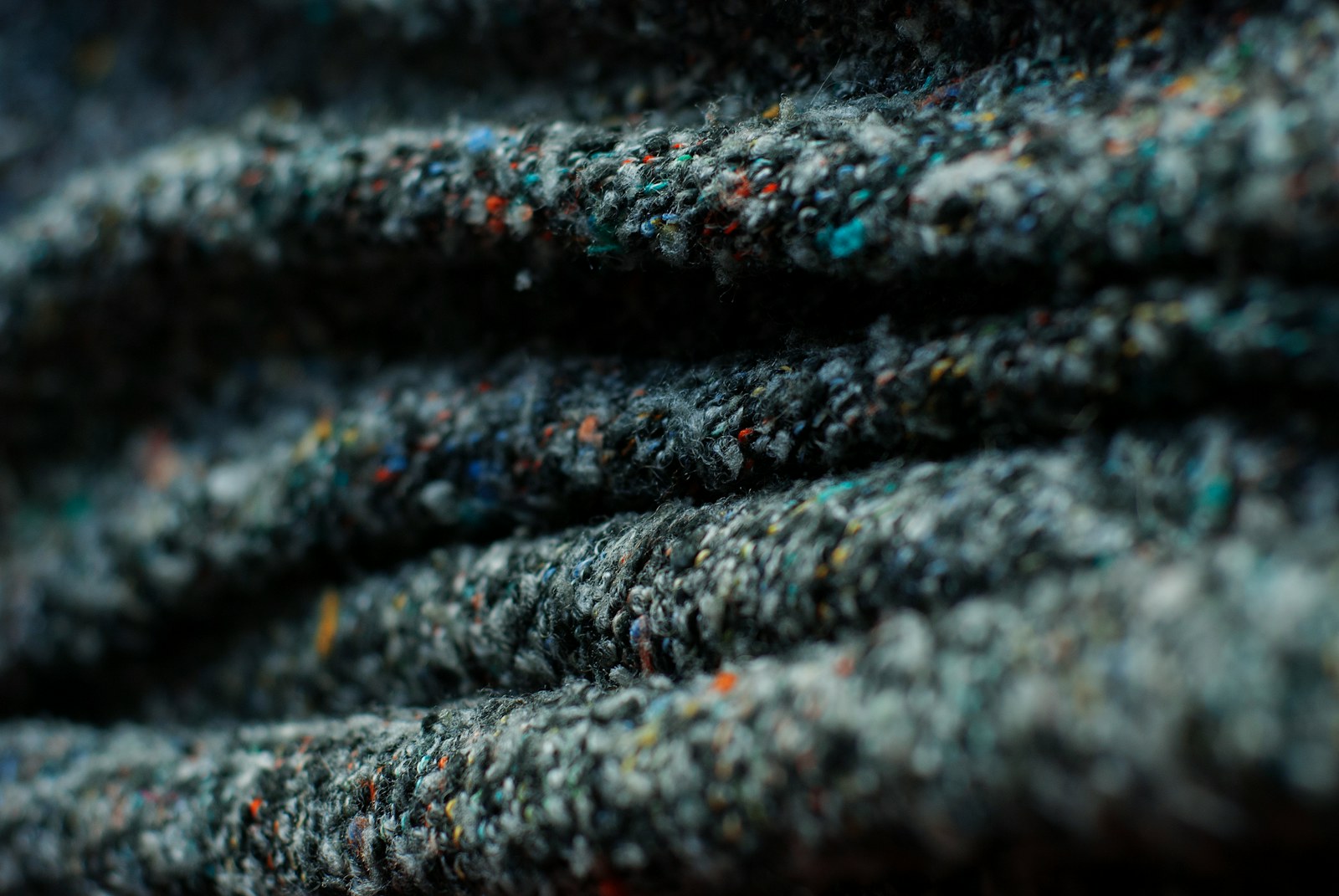 Thick fabric forming folds that show how material structure affects drape