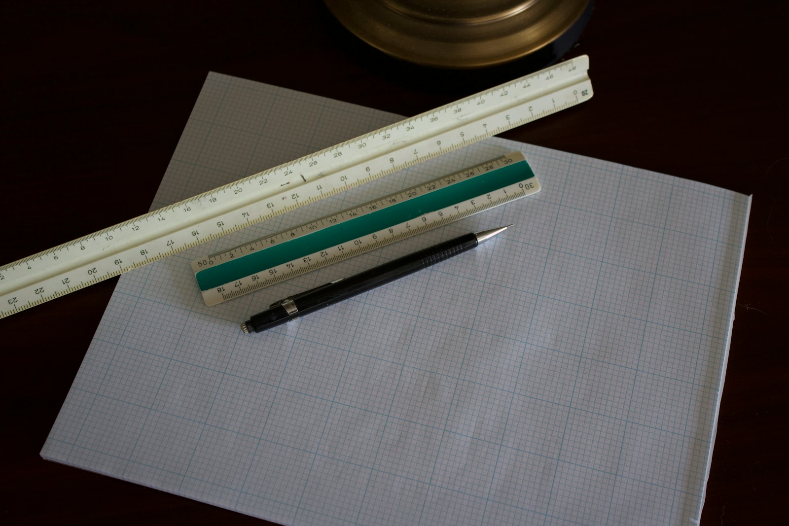 Ruler and paper used for garment pattern measurement and grading