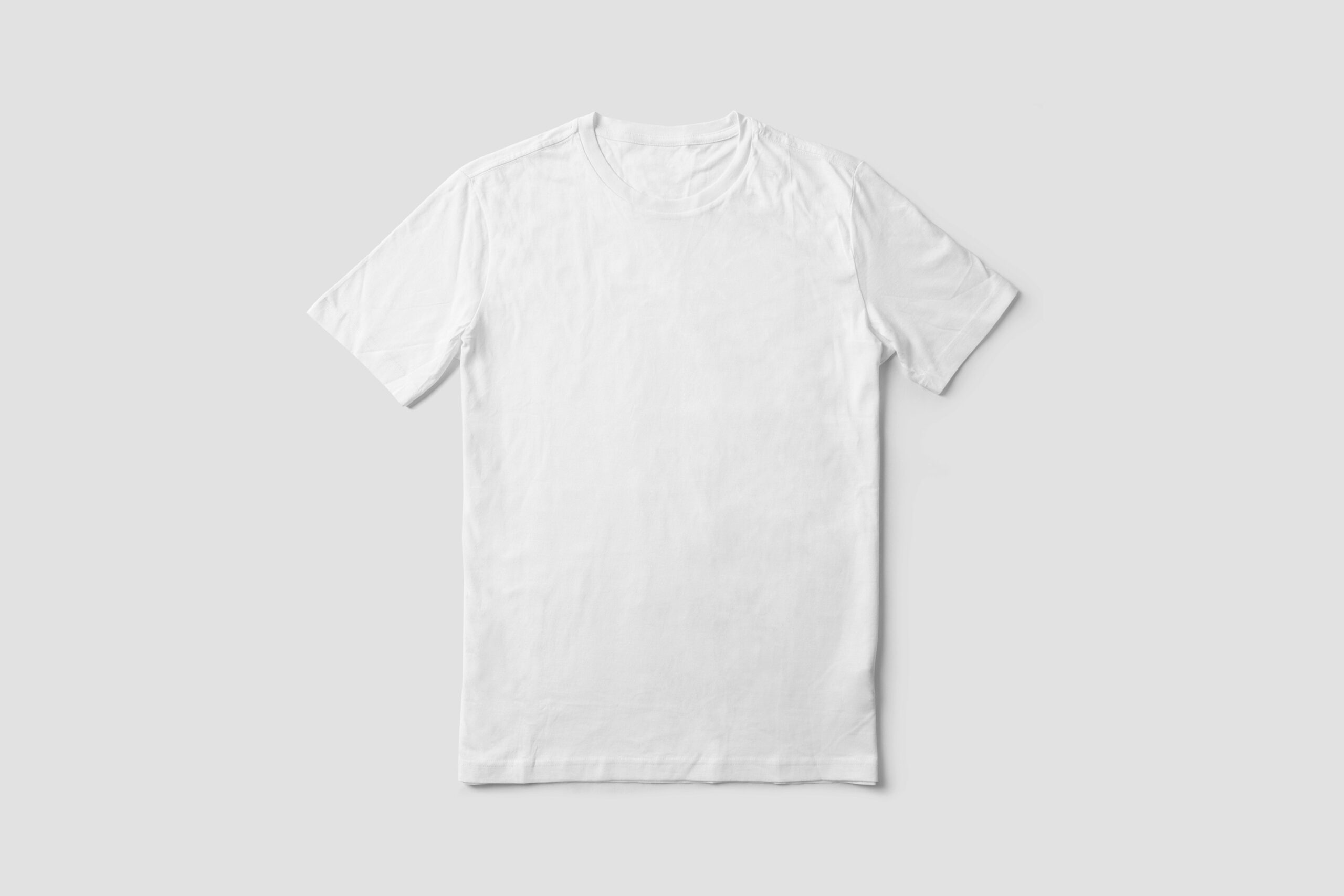 Plain oversized white T-shirt laid flat