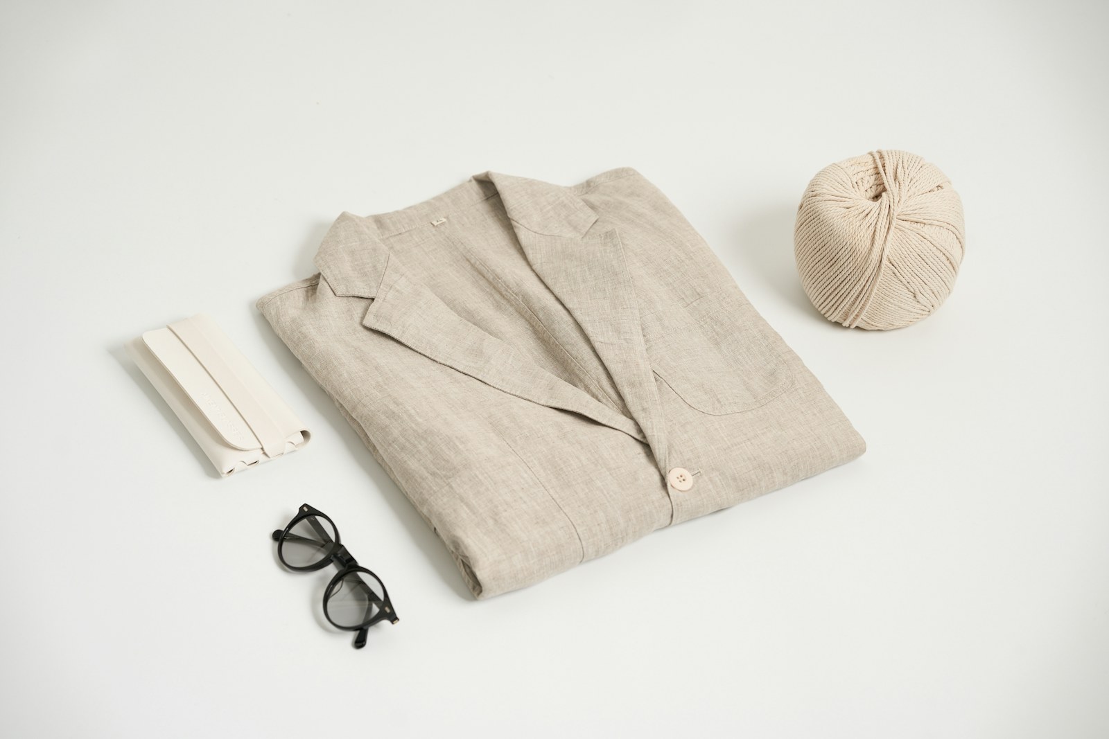 Tailored jacket laid flat to show the structured outer shape created during construction