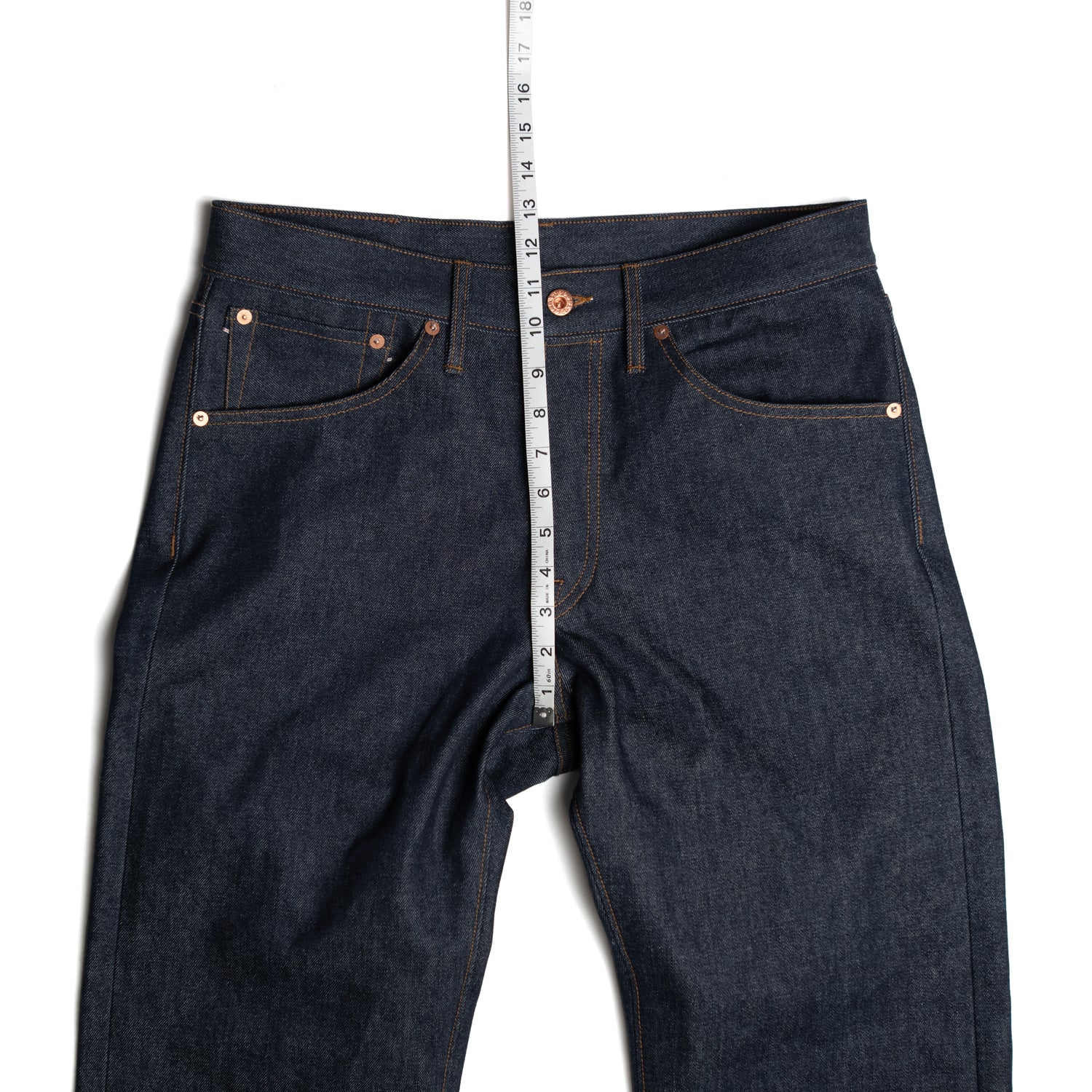 Front rise measured from the crotch point to the waistband